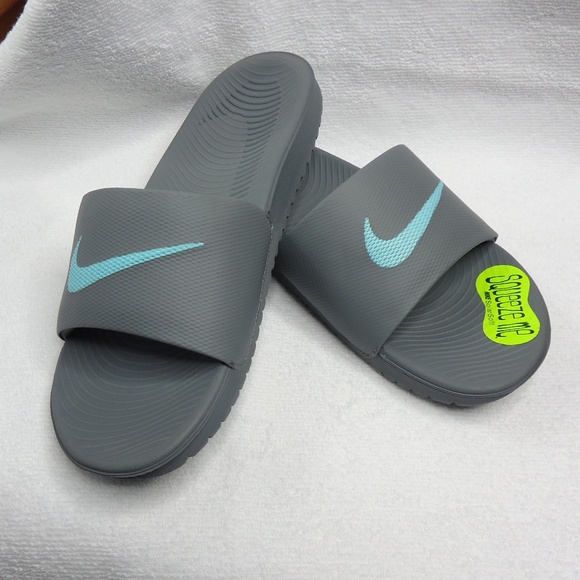 turquoise nike slides